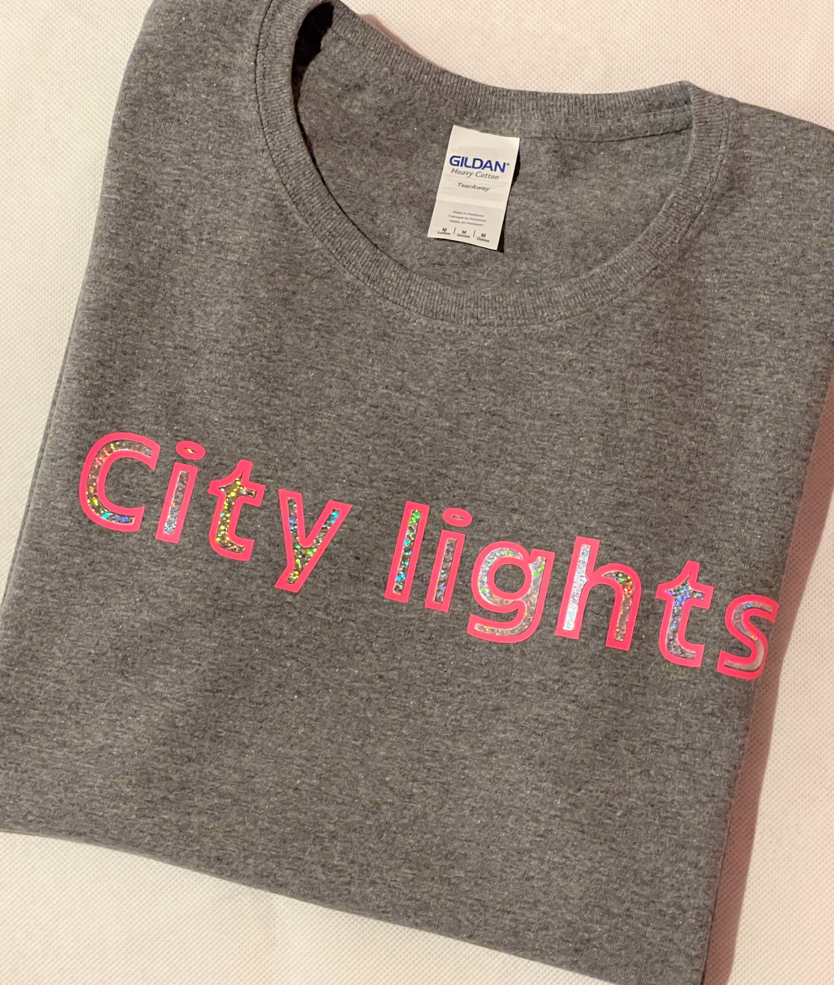 CITY LIGHTS Pink and White Logo